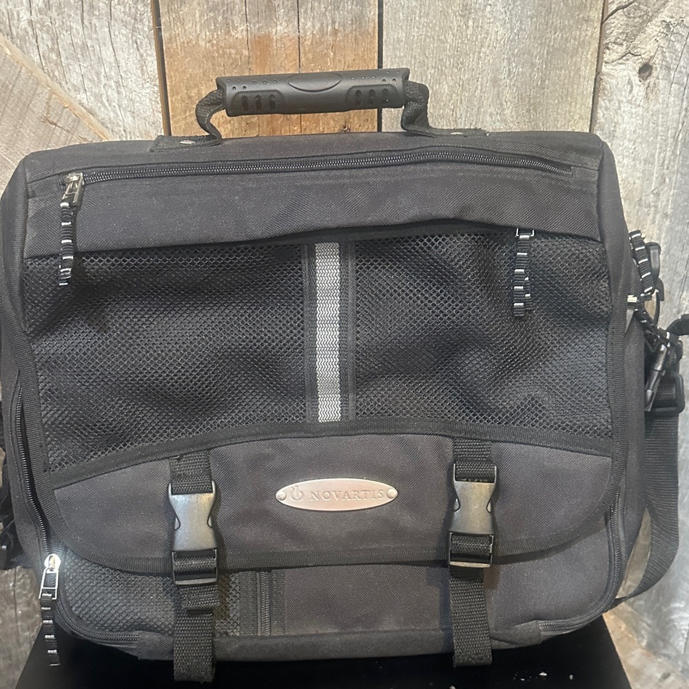 Black Novara Men's Messenger Bag with Reflective Accent